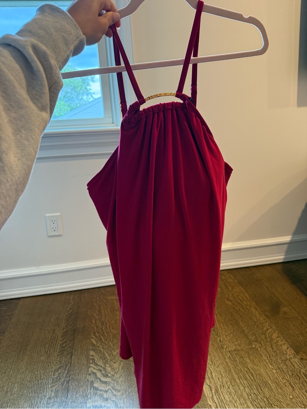Sleek Red One-Piece Swimsuit with Gold Neck Accent
